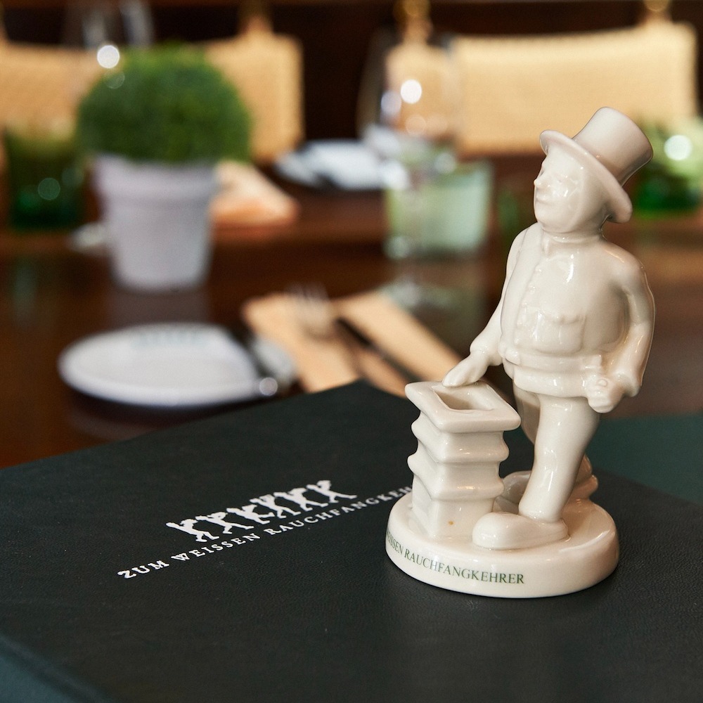 Porzellanfigur des weißen Rauchfangkehrers